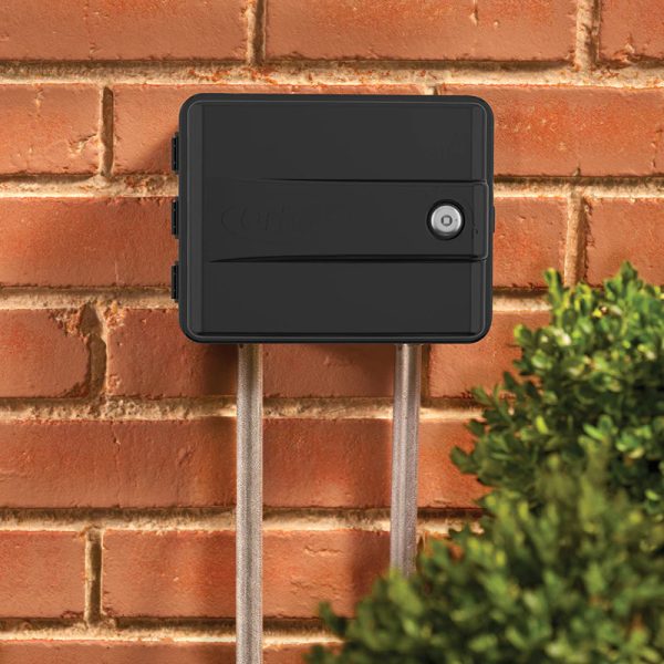 orbit Easy-Set Logic swing door sprinkler controller installed in garden